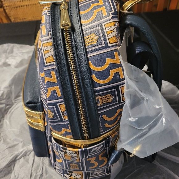 Exclusive2024 Disney Parks Hollywood Studios 35th Anniversary Loungefly Backpack - Picture 3 of 7